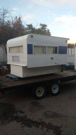 The meme is a photo of a small, retro-style camper van with a distinctive shape and a bold, colorful design. The image is captioned "I've been driving for hours and I still have no idea where I am" and features a humo...