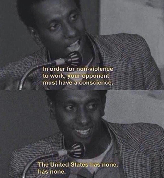 This meme is a humorous take on the famous "I am a man" speech from the 1964 film "I Am a Man", where a civil rights activist is beaten by police. The meme juxtaposes a quote from the speech with a humorous and ironic commentary. The image shows a black-and-white photo of a man speaking into a microphone, with a quote overlayed on top: "In order for non-violence to work, your opponent must have a conscience. The United States has none, has none."