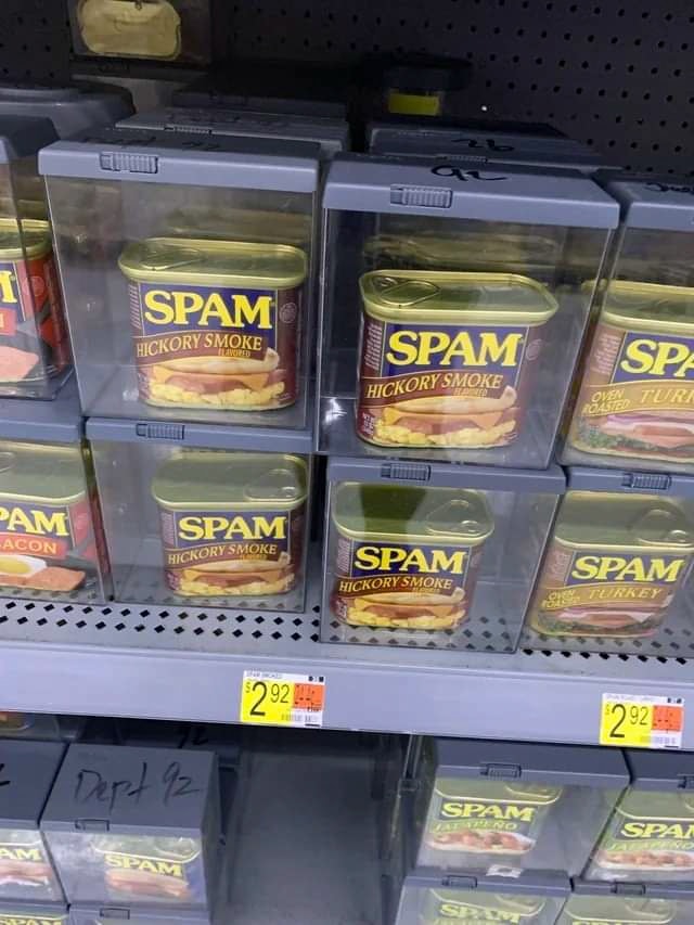 This meme is an image of a grocery store shelf with a sign that says "Limit 3" above a stack of Spam cans. The sign is accompanied by a note that says "We're not kidding". The implication is that the store is trying to prevent customers from buying too much of the canned meat product.