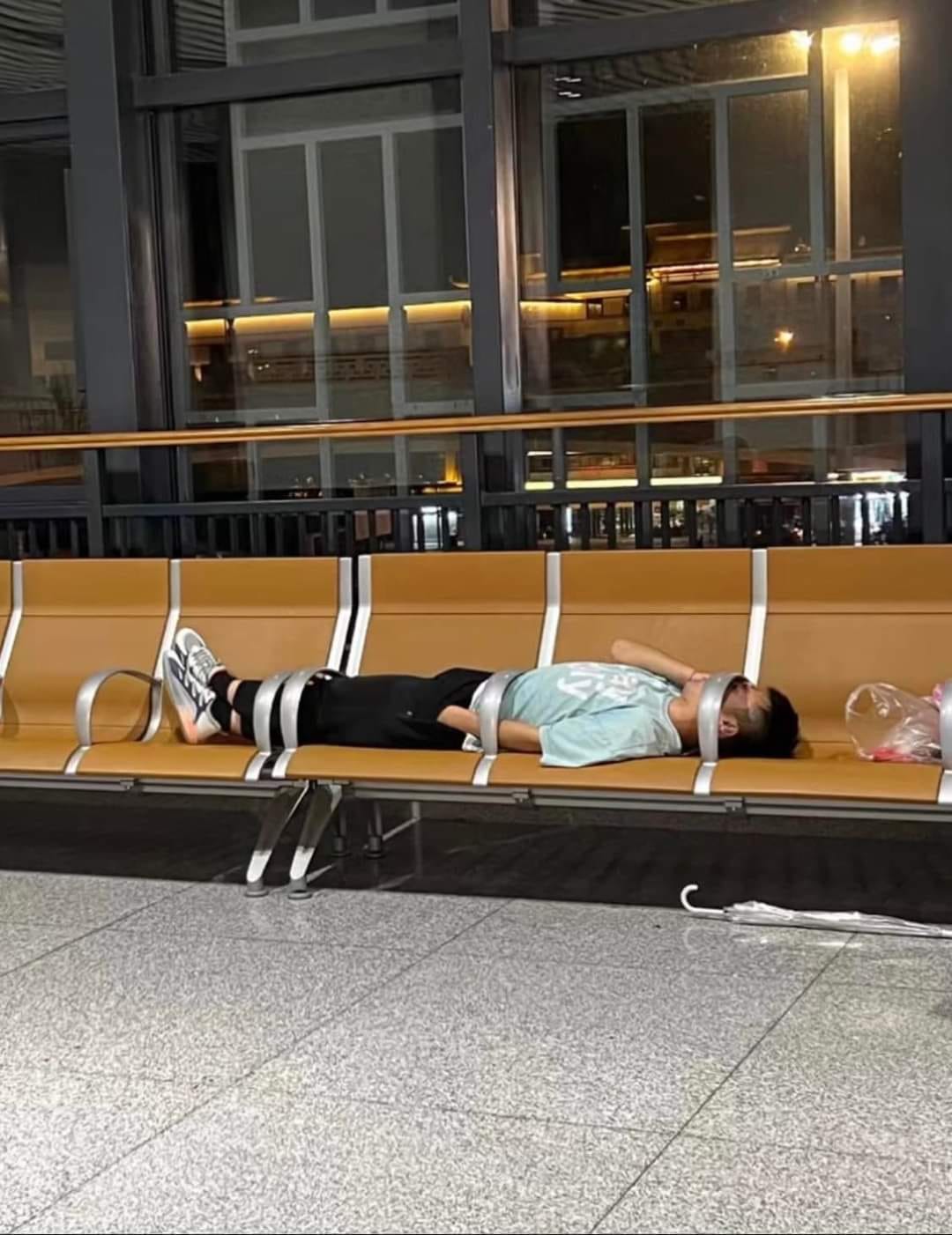 This meme features a photo of two people, presumably friends or family, who are sitting in a row of chairs, but have somehow become physically tangled together in a way that looks like they're stuck in a permanent hug. The text "I'm not arguing, I'm just explaining why I'm right" is overlaid on top of the image, implying that the people in the photo are engaged in a heated discussion. The meme is likely meant to be humorous and relatable, poking fun at the idea that sometimes, people just get stuck in arguments and can't seem to agree.