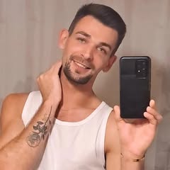 Okay, here's an analysis of the image, broken down into sections as requested. I will only include sections that have relevant application to the image. **Visual Description** The image depicts a young man, likely in...