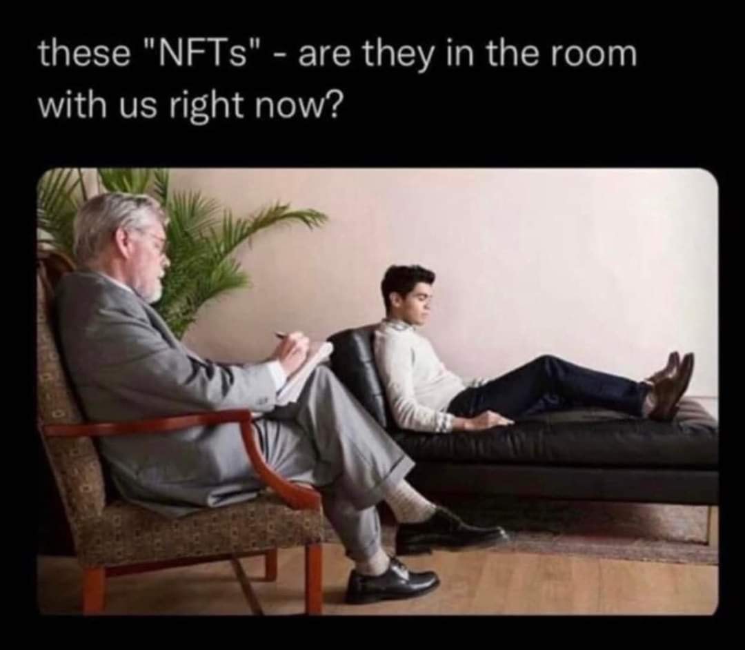 This meme is a humorous take on the current state of online communities, particularly those focused on NFTs (non-fungible tokens). The image depicts a therapist's office, where a patient is saying "these NFTs - are they in the room with us?" as if questioning the therapist about the presence of digital assets. The caption is a play on the common phrase "are they in the room with us?" which is a therapy session question, but in this case, it's applied to the concept of NFTs being a part of online culture.