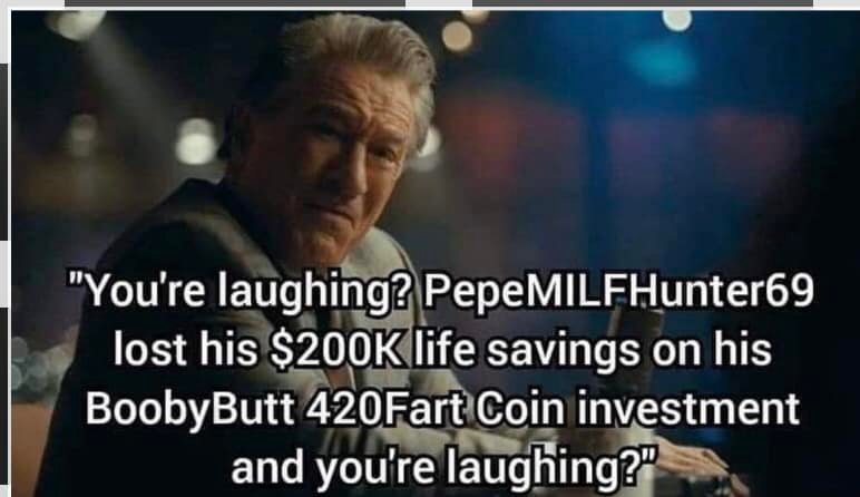 The meme is a screenshot of a character from the movie "The Wolf of Wall Street" with a quote overlay. The text "You're laughing? You're laughing?" is overlaid on the image, and the quote "You're laughing? You're laughing? You're laughing?" is also included. The image is likely used to mock or comment on someone's reaction to a joke or situation.