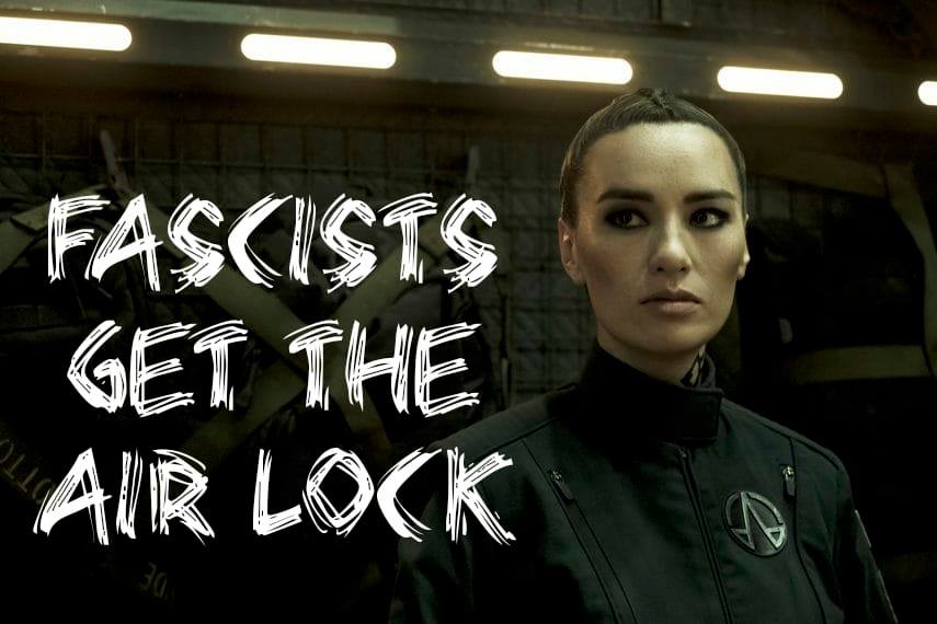 The meme features a still image of a woman from the movie "The Hunger Games" with a serious expression. Superimposed over the image is the phrase "Fascists get the air lock," which is a play on the phrase "fascists get the boot," a popular meme that uses the image of a boot stamping on a person's face to represent the idea of getting rid of something or someone. In this version, the air lock is a metaphor for a metaphorical or literal "kicking out" or "expelling" of someone or something. The image is likely meant to be humorous or satirical, perhaps commenting on the idea of "kicking out" or "expelling" someone or something that is seen as problematic or undesirable.