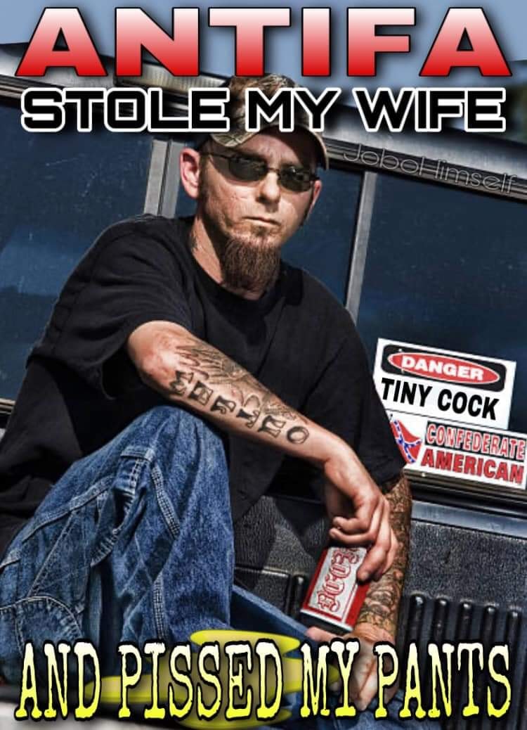 The meme features a photo of a man with tattoos and a scowling expression, sitting on the back of a pickup truck. The text at the top reads "ANTIFA STOLE MY WIFE" and at the bottom "AND PISSED MY PANTS". The image is a humorous and satirical take on the stereotype of a working-class, anti-Left, right-wing individual.