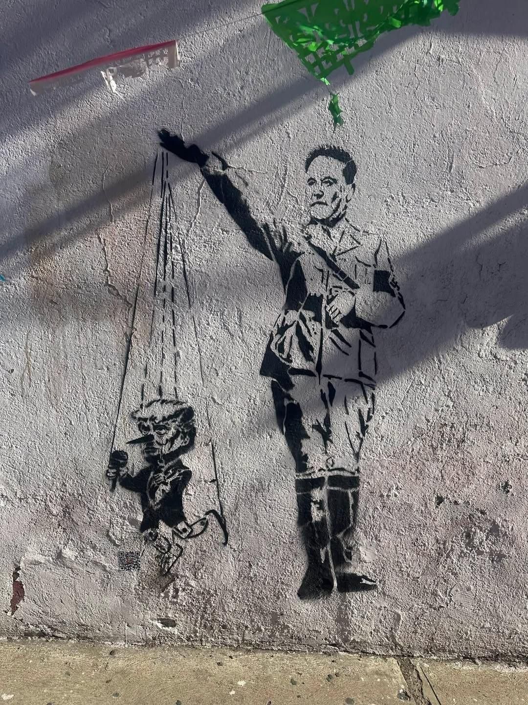 The meme is a photo of a street art mural featuring a cartoonish, satirical image of former Mexican President Porfirio Dí­­­­­­­­­­­­­­­­­­­­­­­­­­­­­­­