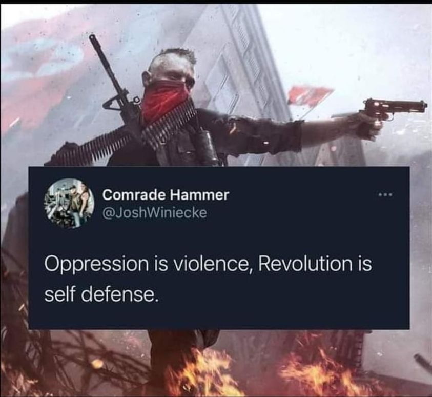 The meme features an image of a man in an action pose, holding a gun and an AK-47, with a red bandana covering his face. The background is a burning building, with flames and smoke visible. The text in the image reads: "Oppression is violence, revolution is self-defense." The image is overlaid with a quote from Comrade Hammer, a Twitter account, which adds a commentary on the concept of revolution and self-­­­­­­­­­­­­­­­­­­­­­­­­­­­­­­­