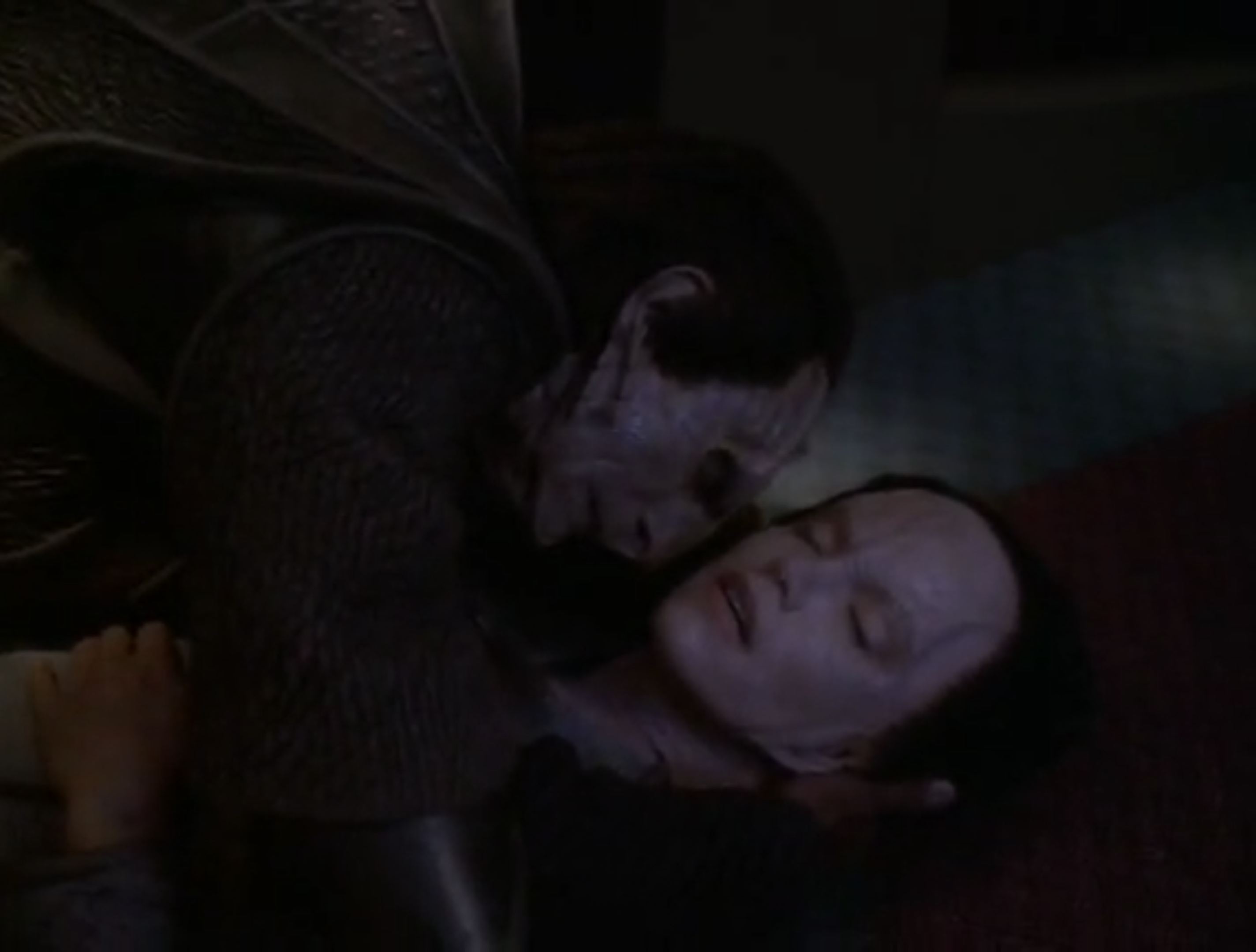 This meme features an image of Spock and Captain Kirk from the Star Trek franchise. In the image, Spock is lying on his back with his head on Captain Kirk's chest, and his eyes are closed. The image is dark and the faces are not clearly visible, but it appears to be a moment of tender intimacy between the two characters. The text in the image reads, "I'll be back." The meme is likely intended to convey a sense of comfort and trust between the two characters, as they are often depicted as having a close and affectionate relationship.
