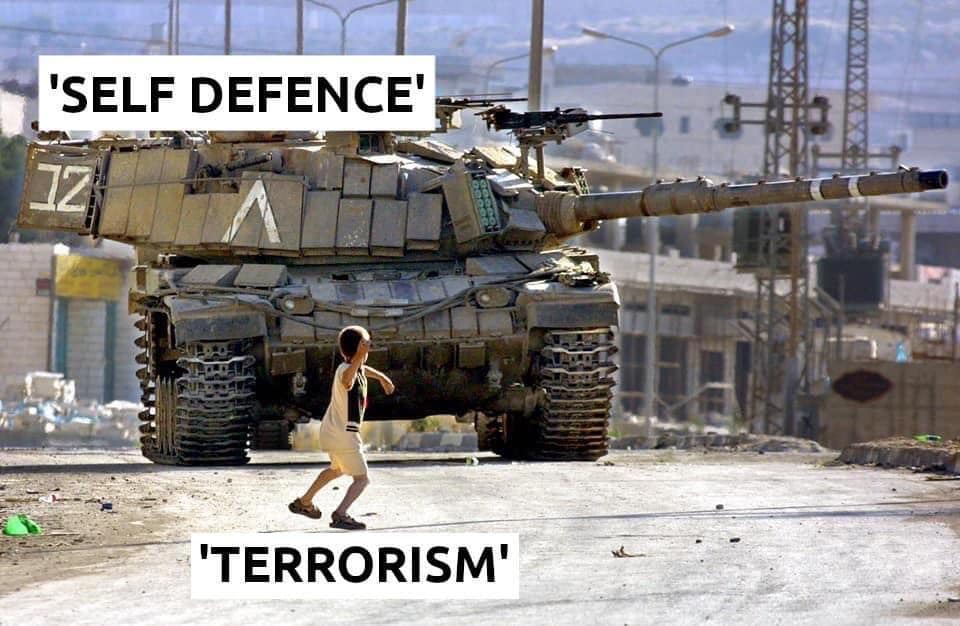 The meme is a play on the concept of "self-defence" vs. "terrorism" with a child running away from a tank. The image likely shows a small child running away from a large tank, with the words "Self Defence" and "Terrorism" written above and below the child, respectively. The joke is that the child is running away from the tank, which is a much larger and more powerful entity, and the meme is suggesting that the child's actions are being judged as "terrorism" rather than "self-defence" due to the power imbalance.
