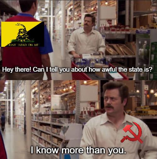 The meme is a still image from a TV show, with two characters in a grocery store. One character, played by Nick Sorenson, is wearing a t-shirt with a logo of a red hammer and sickle, a symbol of the Soviet Union. The other character, played by Nick Sorensen, is wearing a t-shirt with a logo of a red hammer and sickle, a symbol of the Soviet Union. The text "I know more than you" appears above the character's head, and the text "I know more than you" appears above the character's head. The text "I know more than you" appears above the character's head.