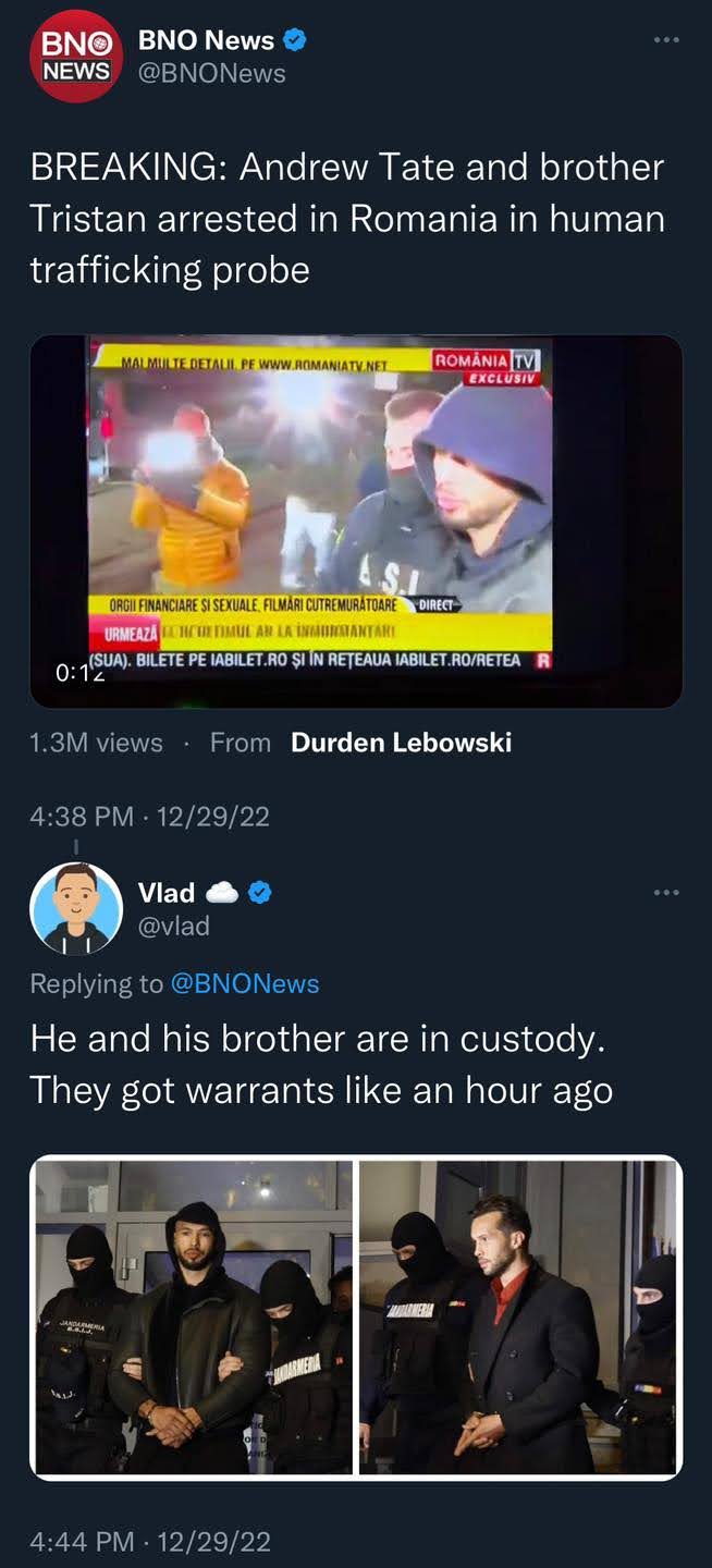 The meme is a screenshot of a news article from BNO News with the headline "BREAKING: Andrew Tate and brother Tristan arrested in Romania in human trafficking probe". The article is accompanied by a photo of the two brothers in handcuffs, surrounded by police officers. The text below the photo reads "He and his brother are in custody. They got warrants like an hour ago."