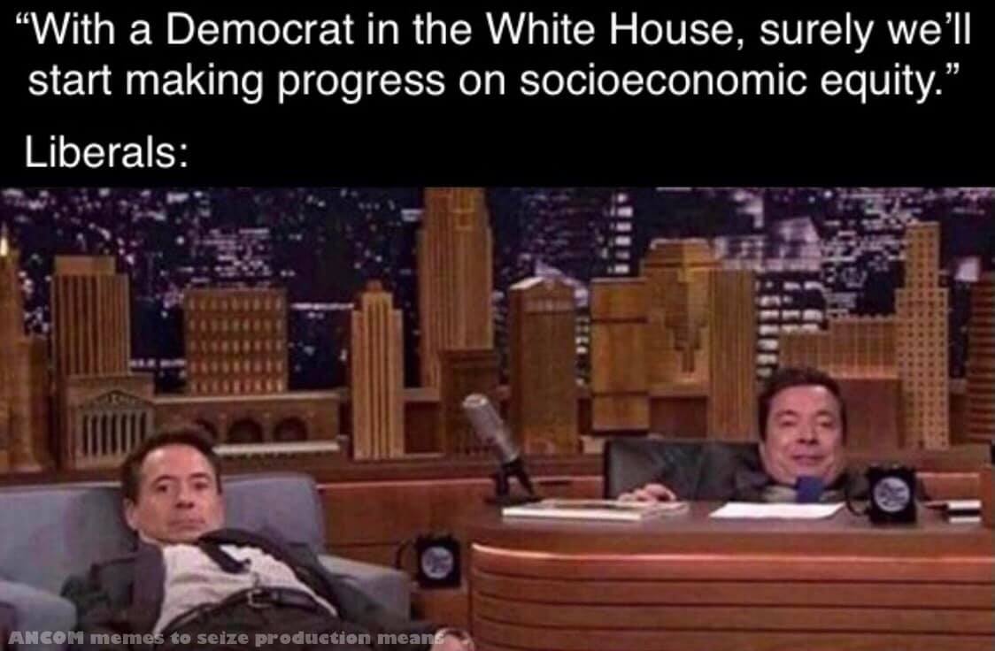 The meme is a humorous image of two men, Jimmy Fallon and Jimmy Kimmel, from a TV show, looking shocked or surprised. The text above them reads: "In 2021, Democrats and Republicans agreed on a $1.5 trillion infrastructure bill, which will create jobs, improve roads, and reduce carbon emissions. 'With a Democrat in the White House, we'll be able to do it.' - Joe Biden" is replaced with "With a Democrat in the White House, we'll be able to do it." and then "With a Democrat in the White House, we'll be able to do it." is replaced with "With a Democrat in the White House, we'll be able to do it."
