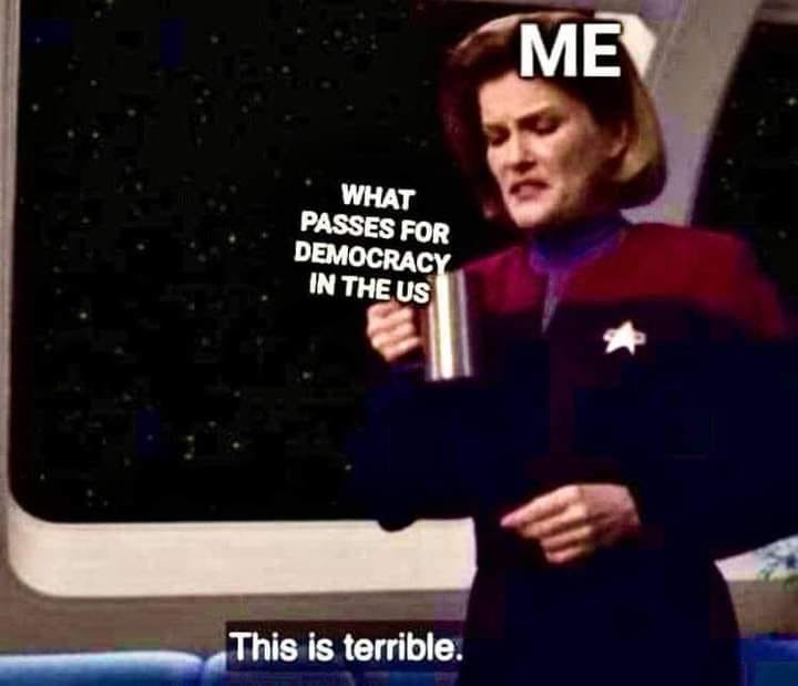 The meme is a humorous take on the idea that the concept of democracy is often criticized or seen as flawed in the United States. The image features a character from the TV show Star Trek: The Next Generation, Captain Jean-Luc Picard, holding a cup of coffee and saying "This is terrible." The text "What passes for democracy in the US" is written on the cup, implying that the speaker finds the concept of democracy in the US to be disappointing or ineffective.