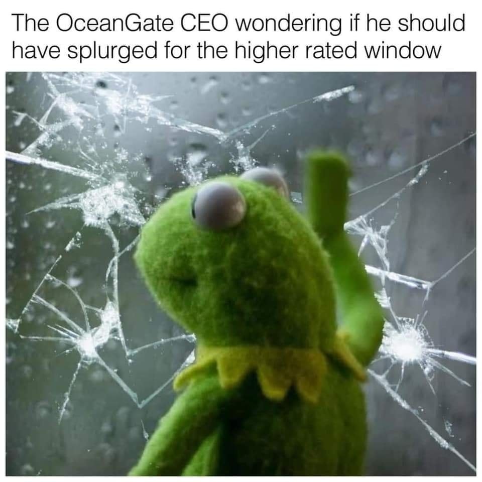 This meme features a photo of Kermit the Frog's "It's not easy being green" character with his hand through a broken window. The text above the image reads, "The OceanGate CEO wondering if he should have splurged for the higher rated window." The meme is a humorous commentary on the tragic sinking of the OceanGate submersible, which was equipped with a subpar window that contributed to the disaster.