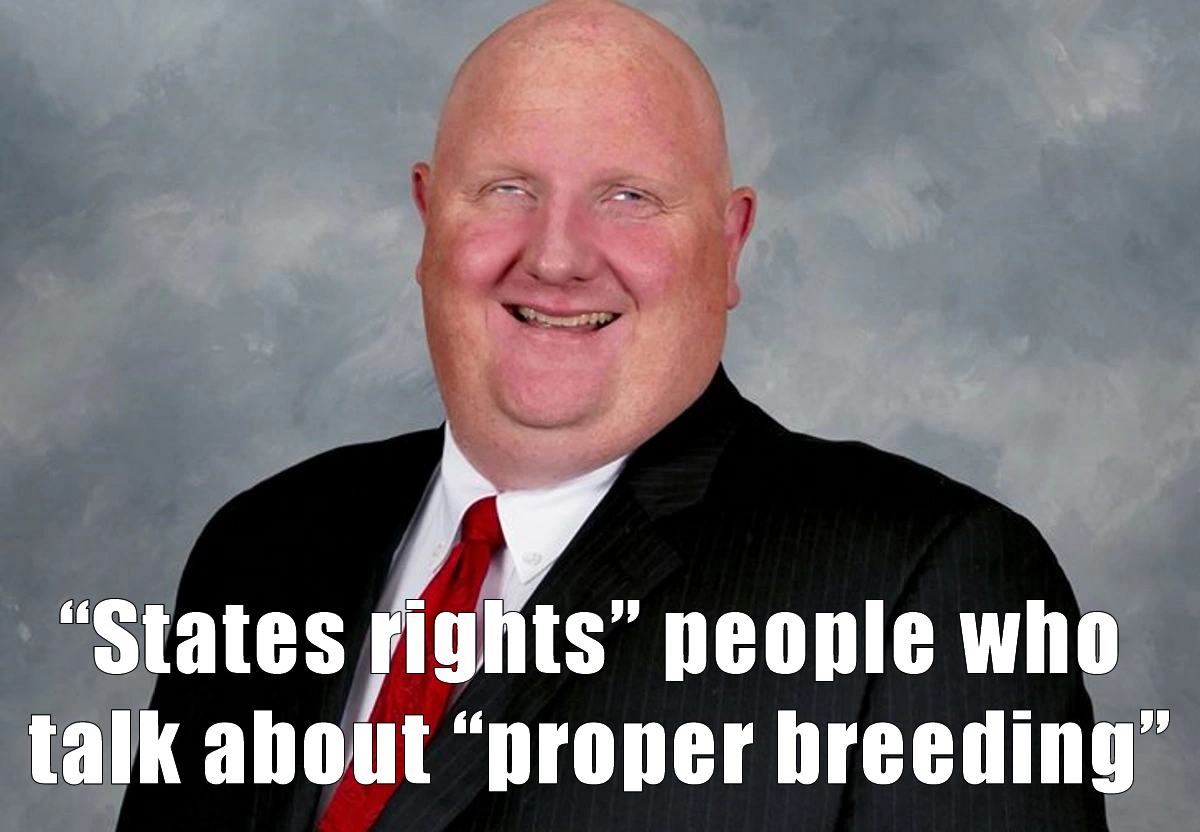 The meme features a photo of a man with a smug, self-satisfied expression. The text at the top reads, "When you're a politician who's been accused of 'state's rights' but actually means 'let's make sure we can keep our kids' bodies locked down until they're 18 and never, ever get a job'." The text at the bottom says, "I'm a 'states rights' person and I don't mean 'states rights'."