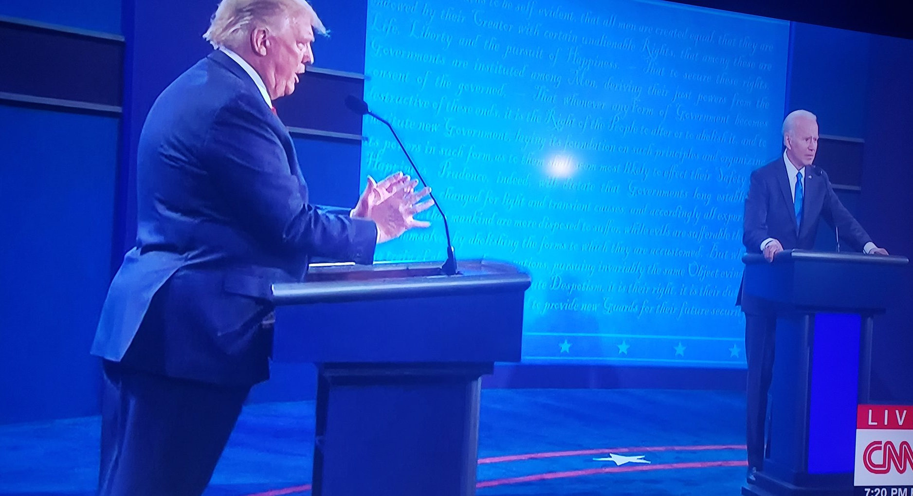 This meme is a screenshot of a 2020 presidential debate between Donald Trump and Joe Biden. The image shows Trump standing at a podium, with a shocked expression on his face, as if he's about to say something. The text overlayed on the image reads "When you realize you're on a debate with a  [insert insult]" but the rest of the text is cut off.