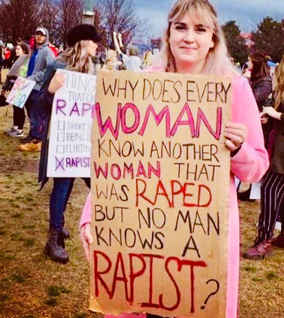 This meme is a humorous take on the #MeToo movement, which highlights the prevalence of sexual assault and harassment. The image shows a person holding a sign with a question that pokes fun at the idea that every woman knows a victim of sexual assault, but no one knows a perpetrator. The text on the sign reads: "Why does every woman know a victim of rape, but no man knows a rapist?"