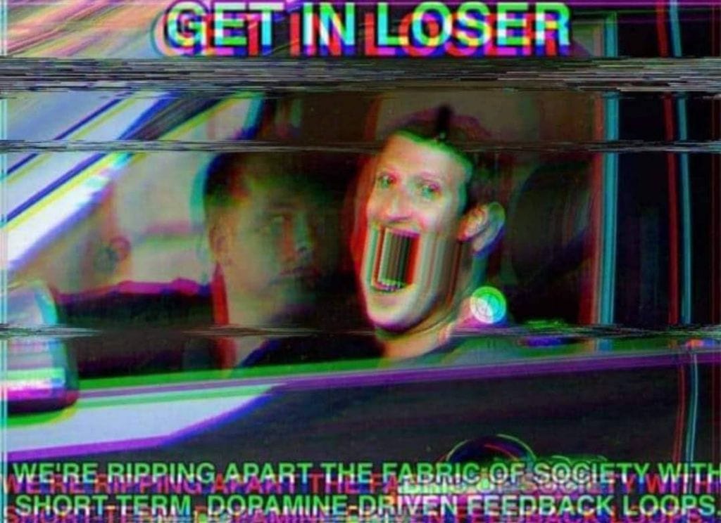 This meme features a photo of a person with a shocked expression, and the text "GET IN LOSER" is written in a bold, neon font at the top. The image is intentionally distorted and glitchy, with pixels and lines overlapping and blending together in a chaotic manner. The text at the bottom reads "WE'RE RIPPING APART THE FABRIC OF SOCIETY WITH SHORT-TERM, DORAMINE-DRIVEN FEEDBACK LOOPS".