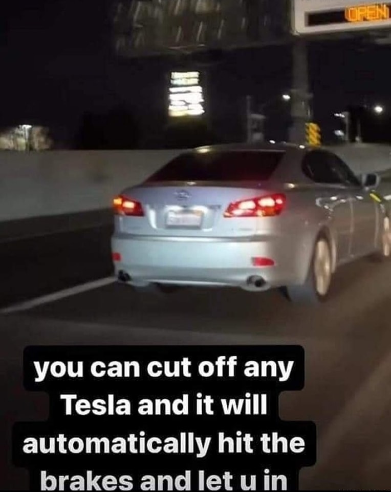 This meme is a humorous image of a car driving through a toll booth with a sign that says "TOLL" but is actually a Tesla electric car that has automatically paid the toll without needing to stop. The text at the bottom of the image reads: "You can cut off any Tesla and it will automatically pay for you."