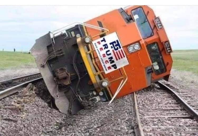 The meme is a photo of a train with a derailed car, with the front of the train upside down and the wheels in the air. The caption is "When you're trying to make a left turn but you're a train" and a sign on the train reads "TRUMP PENCE 2020".
