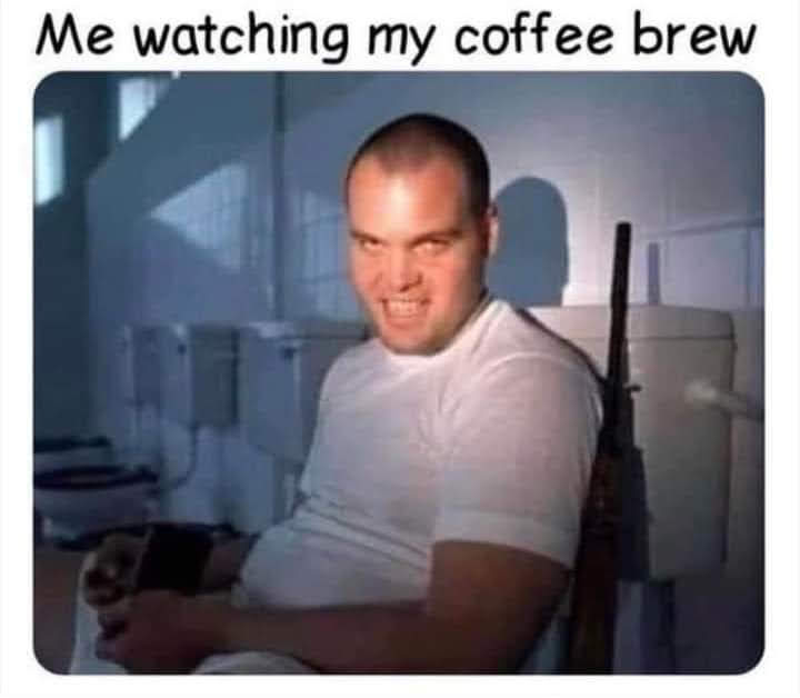 This meme features a picture of a man with a look of intense, almost unhinged, concentration, as if he's completely absorbed in something. The text above the image reads "Me watching my coffee brew". The meme is likely meant to be humorous, poking fun at the idea that someone can become so engrossed in a mundane activity like watching a cup of coffee brew that they become completely absorbed and even a little unhinged.