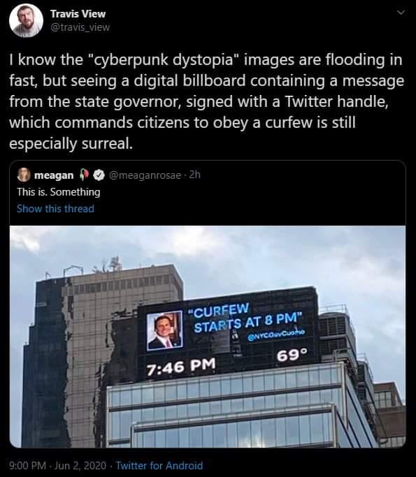 This meme is a screenshot of a digital billboard in New York City that displays a quote from a New York City mayor, saying "curfew starts at 8pm" in a style that is intentionally absurd and humorous, as if it's a warning from a dystopian sci-fi movie. The text is in a futuristic font and is accompanied by a photo of the mayor. The image is meant to be humorous and ironic, poking fun at the idea of a city imposing a curfew in a futuristic, high-tech way.