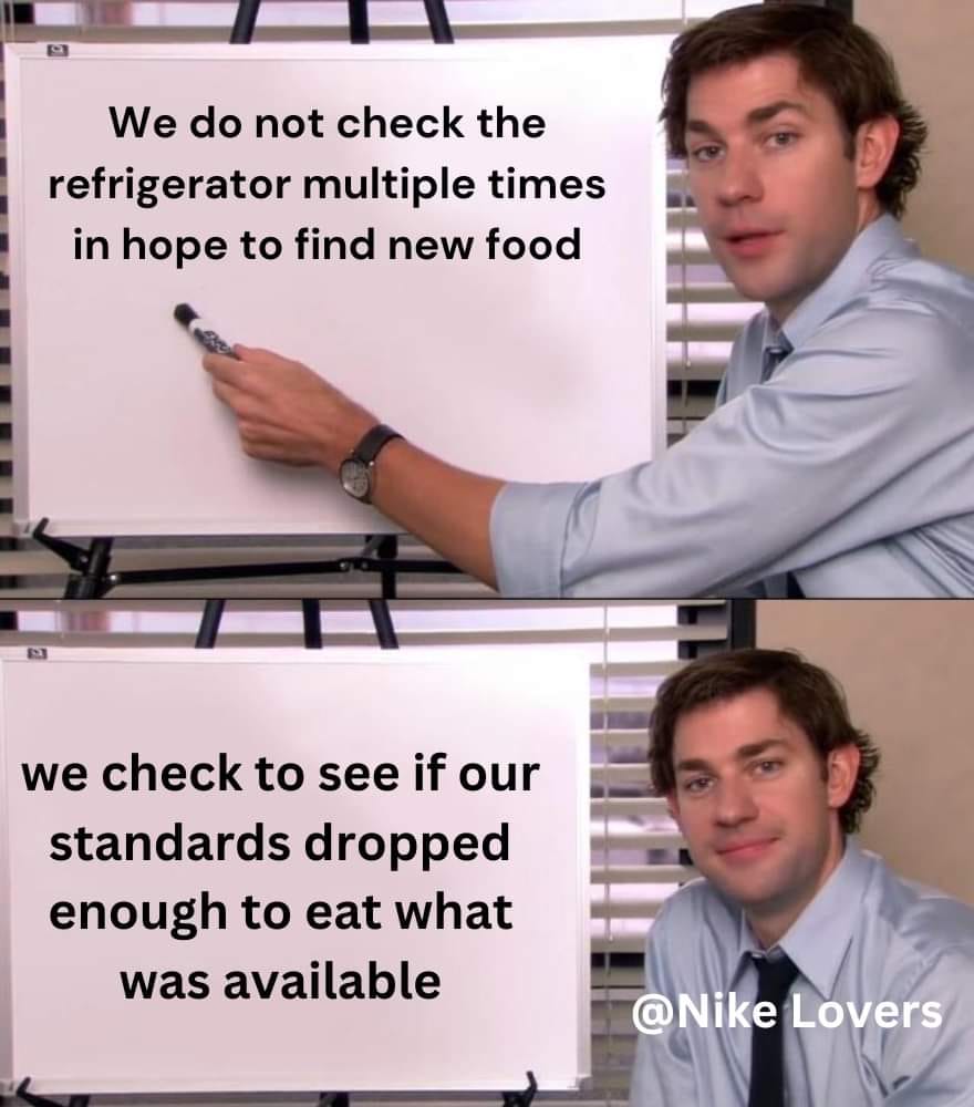 This meme is a humorous take on a common office scenario. It features a character from the TV show "The Office" (Dwight Schrute) standing at a whiteboard, writing out a series of increasingly absurd and mundane tasks he is supposed to complete. The text on the board reads: "We do not check the refrigerator multiple times in hopes of finding new food. We check to see if our standards have dropped enough to eat what was available."