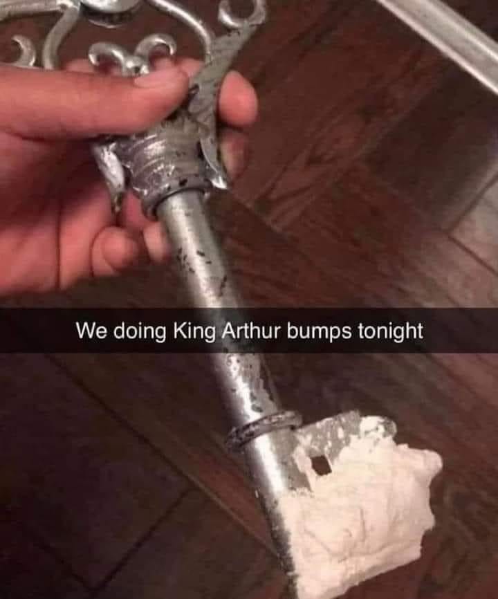 The meme is a humorous image of a person holding a large, ornate key with a chunk of plaster or concrete stuck to the end. The text overlay reads "We're doing King Arthur's thing tonight" and "We're doing King Arthur's thing tonight" is crossed out and replaced with "We're doing King Arthur's thing tonight".