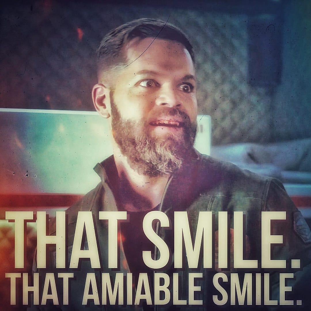 This meme features a screenshot of a character from the TV show "Fargo" with a surprised and amused expression. The text overlay reads "That smile. That amiable smile." in a bold, playful font, implying that the character's smile is both charming and endearing.