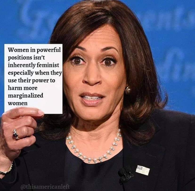 This meme features a photo of a person looking shocked or surprised. In the caption, a quote is presented in a humorous and ironic way, stating "Women in powerful positions are not inherently feminist" and then quickly corrected to "Women in powerful positions are not inherently feminist, especially when they use their power to harm marginalized women."