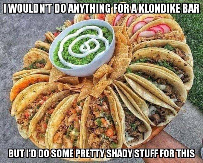 This meme features a photo of a plate of tacos with a bowl of guacamole and a note of self-deprecation. The text reads: "I would do anything for a Klondike bar, but I wouldn't do anything for a taco." The image is humorous because it's a tongue-in-cheek admission that the speaker's priorities are skewed, and they'd rather have a simple dessert than a delicious meal.