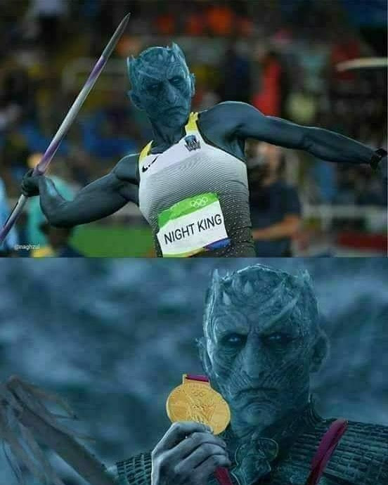 This meme is a humorous mashup of two popular culture references. It shows a photo of the actor Idris Elba, who played the role of Heimdall in the Marvel Cinematic Universe, dressed as the character Heimdall from the Marvel movies, but instead of his iconic armor, he's wearing a sports jersey and holding a javelin. The image includes the text "Night King" on the jersey, a reference to the villainous character from the Game of Thrones TV series.