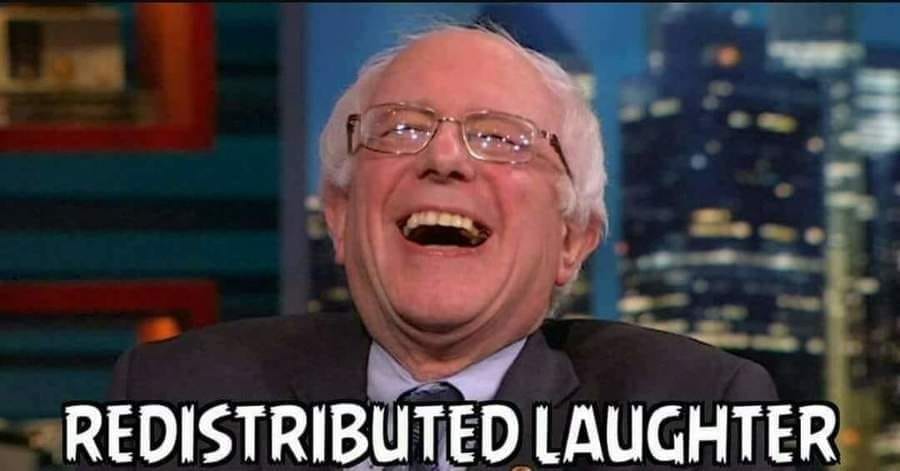 The meme features a photo of Bernie Sanders with a mischievous grin. The text above the image reads "Redistributed wealth" and below it says "Laughter". The meme is likely making a humorous comment on the idea that the wealthy have a lot to laugh about when it comes to their wealth.
