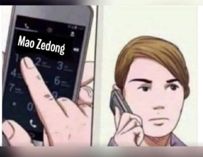 This meme features a character from a web comic or cartoon, who is shown holding a phone with a number pad on the screen. The phone displays the name "Mao Zedong" as the caller ID, which is a historical figure known for his role in Chinese politics. The character's expression suggests they are not pleased to receive a call from someone with a name that is likely to be associated with a very different type of person.