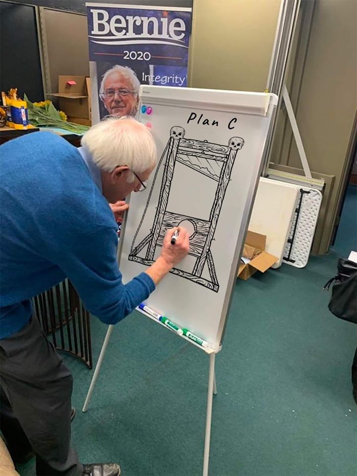 The meme features a drawing of a guillotine with the caption "I can show you my plans" in a mocking tone, referencing Bernie Sanders' 2020 presidential campaign slogan "Not Me. Us." It implies that the speaker's plans...