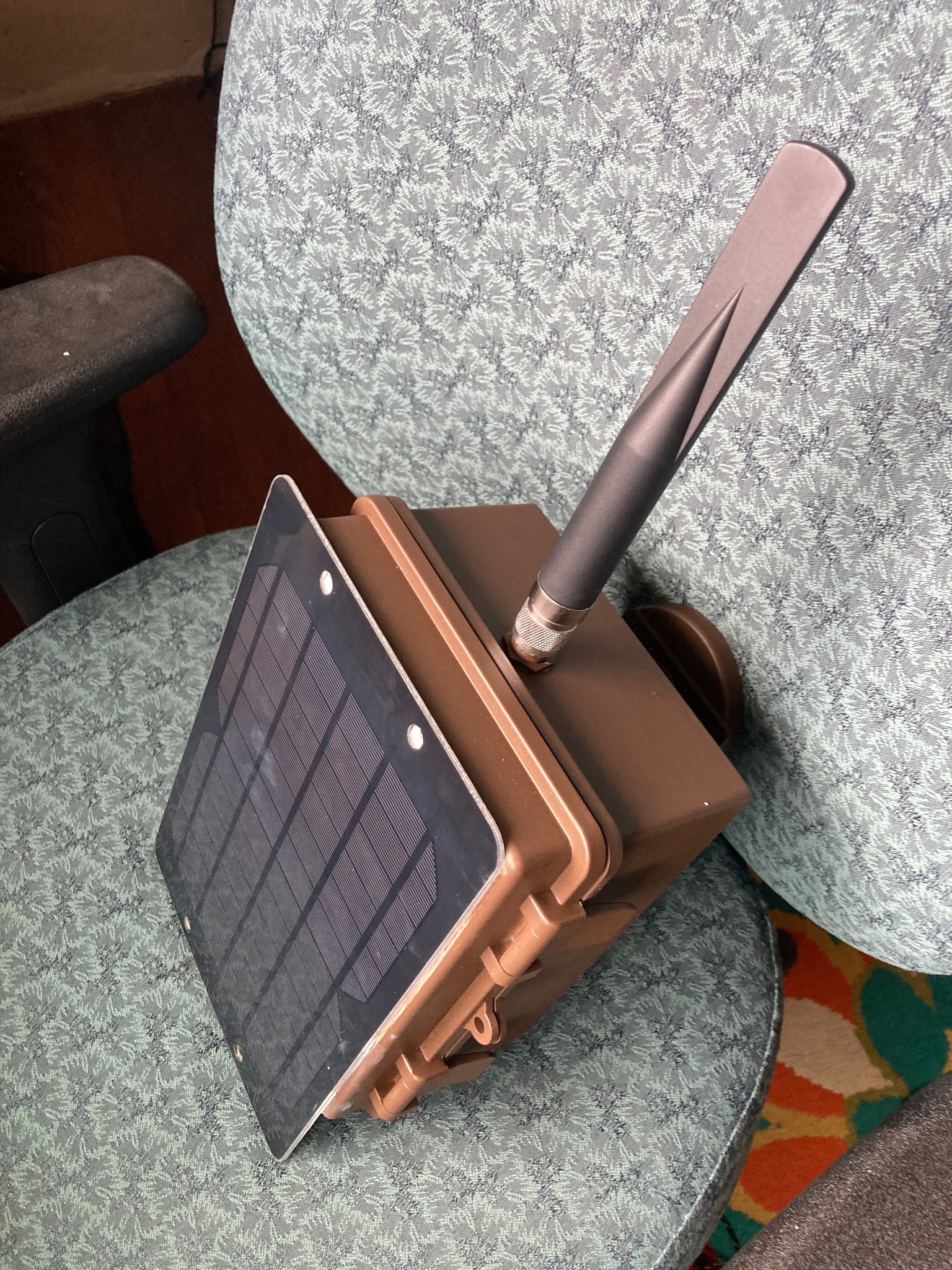The meme is a picture of a solar-powered Wi-Fi router, but it's been modified to look like a miniature, portable, and solar-powered "port-a-potty" with a sign that says "Wi-Fi" and a toilet seat. The sign is a humorous take on the idea that even the most basic, low-tech toilet facilities can have Wi-Fi connectivity.