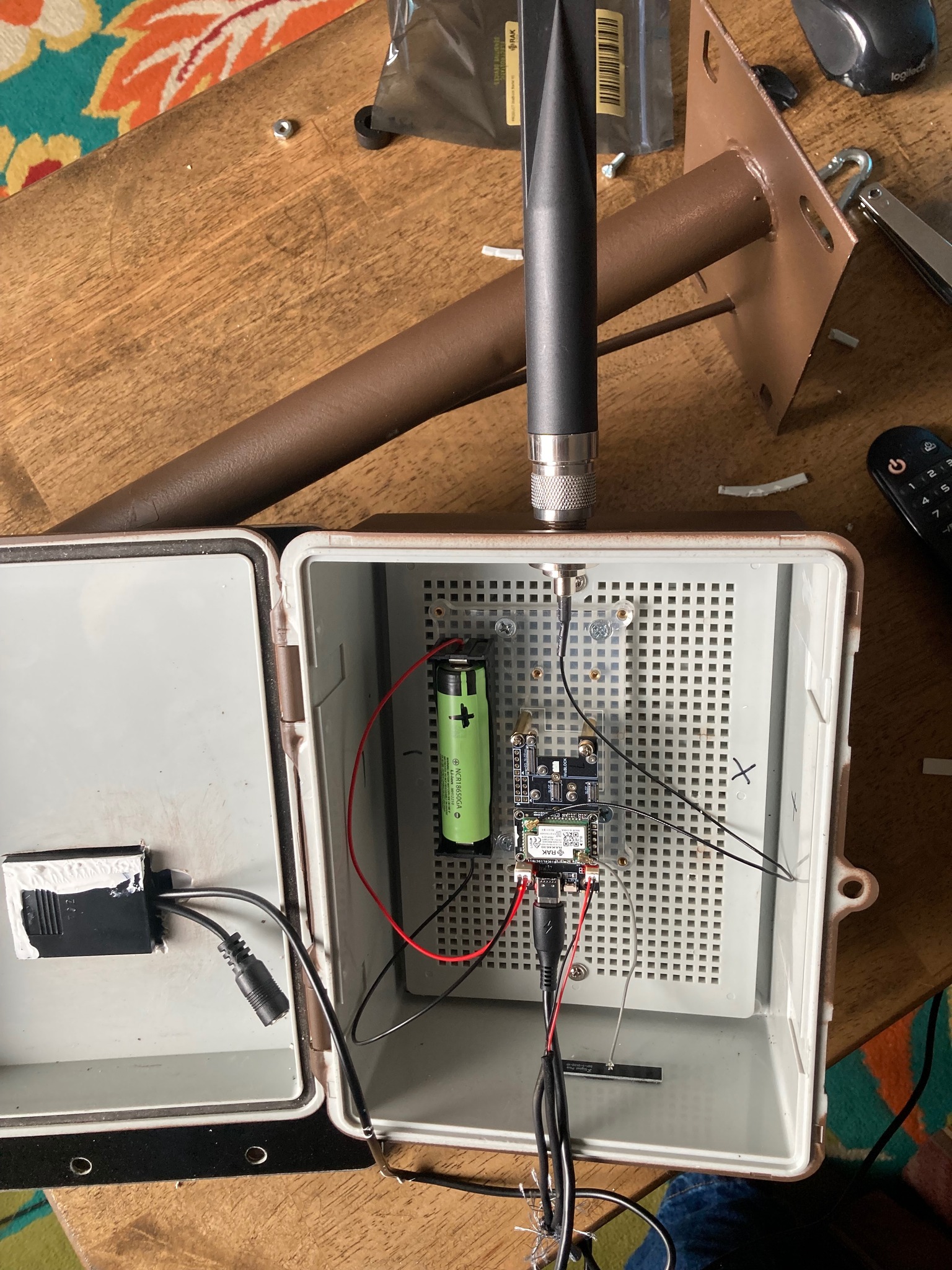 The meme is a photo of a small, DIY-style computer or device with a label that says "Raspberry Pi" on it. The device is surrounded by various electronic components and wires, suggesting that it's a homemade project. The text "I'm not a computer, I'm a Raspberry Pi" appears on a sign in the background.