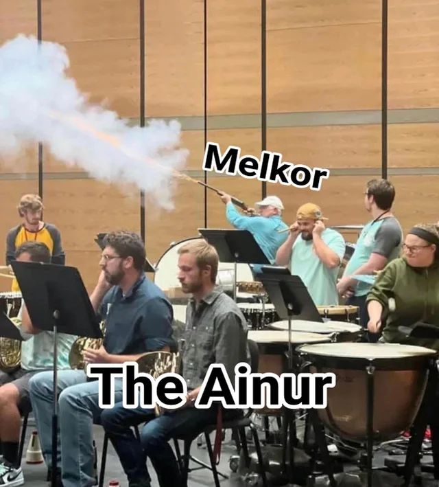 This meme features a group of people playing a musical instrument in a band, but they're all holding cannons instead of instruments. The text "The Ainur" appears in the image, and the word "Melkor" is written above the person in the back holding a cannon, who is also blowing a horn-like instrument.