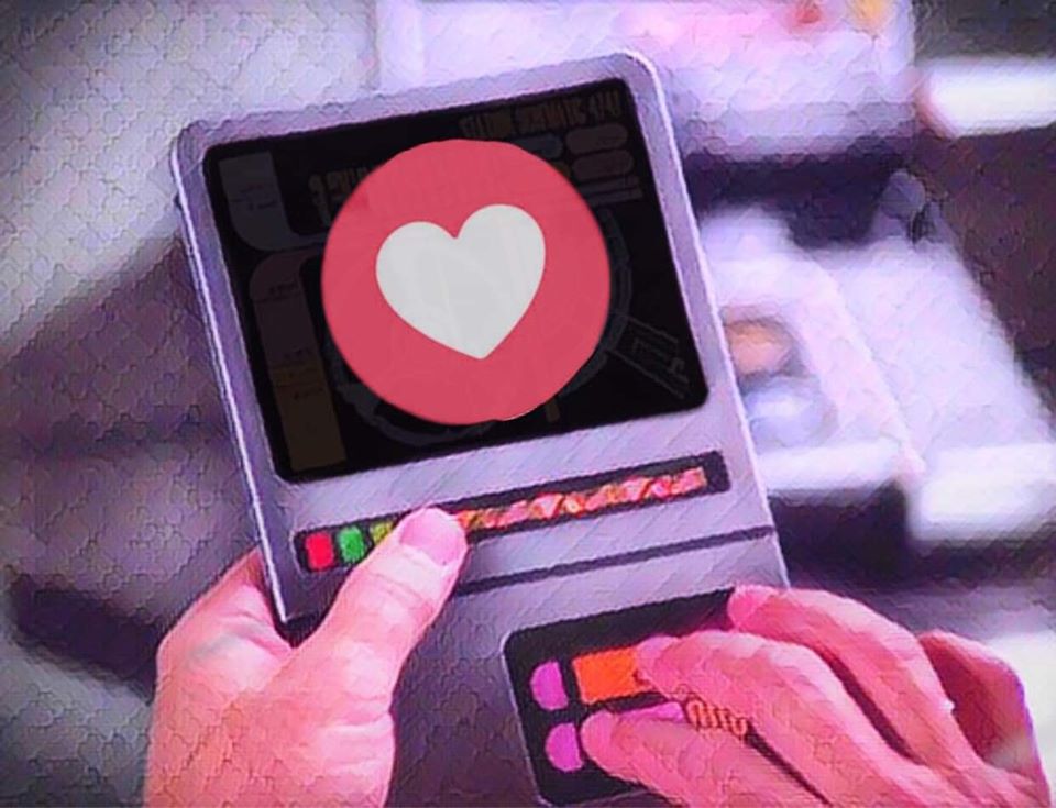 This meme is a screenshot of a character from the TV show "Star Trek: The Next Generation" using a device called a PADD (Personal Access Device) to express his emotions. The image shows the character's PADD displaying a heart symbol, indicating that he's feeling affection or love. The text that appears in the image is the character's name, "Beverly" (the ship's captain), and the phrase "I love you, Beverly".