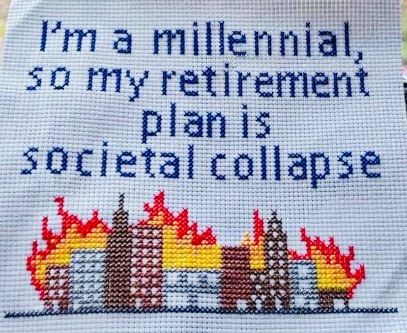The meme is a humorous commentary on the financial struggles of millennials. It features a text overlay that reads, "I'm a millennial, so my retirement plan is societal collapse." The image is likely a cartoon or graphic illustration of a city or building in flames, symbolizing the idea that the millennial generation's financial security is unlikely to be achieved through traditional means, and that the best they can hope for is a catastrophic event to be financially set free.