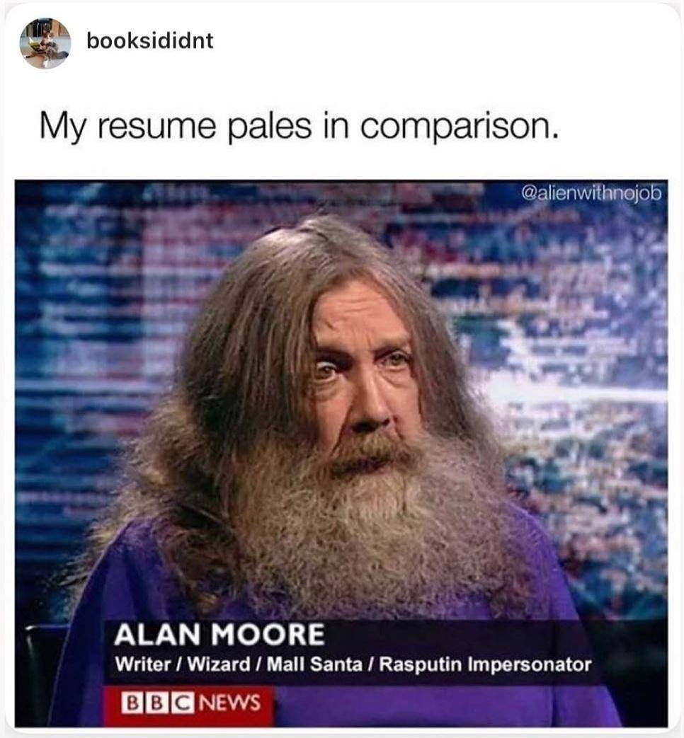 This meme is a humorous take on the concept of a "work in progress" or a resume that is still being edited. The image features a photo of a person with a long, unkempt beard and a wild look in their eye, with the caption "My resume pales in comparison" above it. The text below the image reads "In a 2014 interview, I was described as 'a wizard' and 'a Russian spy' by the BBC. I am not a Russian spy. I am a British wizard and I am not a spy."