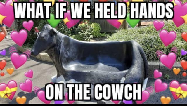 This meme is a humorous take on a popular internet phrase. It features an image of a cow-shaped chair, with the text "What if we held hands on the cowch?" The phrase is a play on words, using "cowch" (a cow-shaped chair) instead of "couch" to create a pun. The meme is likely meant to be humorous and lighthearted, poking fun at the idea of romantic intimacy in a silly and absurd way.
