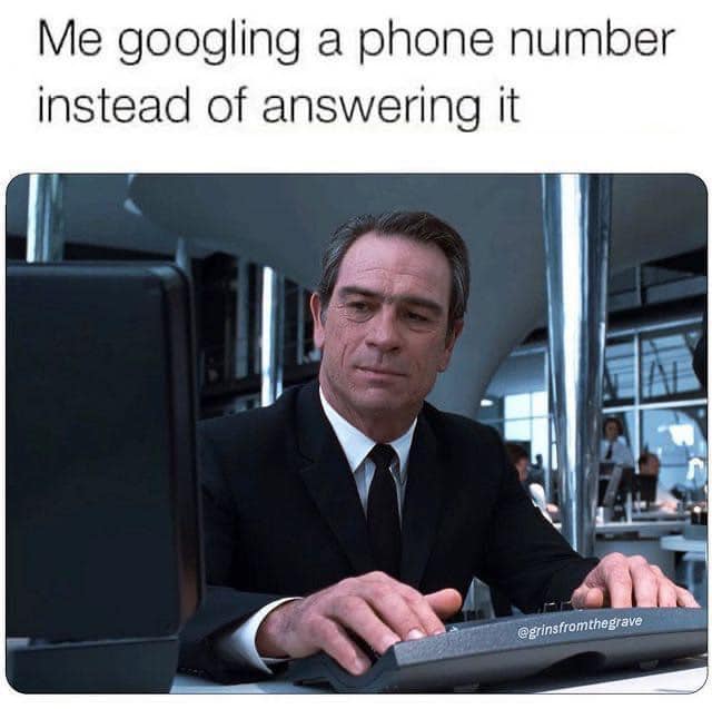 This meme is a humorous image of a man looking at a computer screen with a confused expression. The text above the image reads, "Me googling a phone number instead of answering it." The joke is that the man is searching for the phone number online instead of simply answering the phone call.