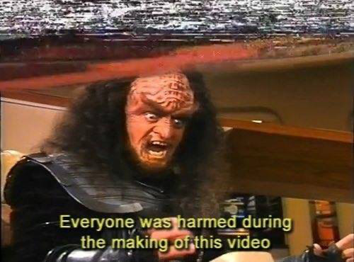 This meme features a still image from the TV show "Star Trek: The Next Generation" of a character, Worf, with a shocked expression. The text overlayed on the image reads: "Everyone was harmed during the making of this video." The meme is likely referencing a humorous or ironic situation where someone is reacting to a poorly made or embarrassing video.