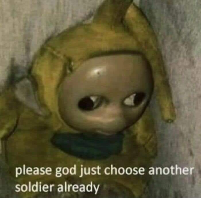 This meme is a humorous image of the character Oobla Oobla from the 2005 film "The 5th 5th" with a confused expression. The text overlaid on the image reads "please god just choose another soldier already". The meme is likely used to express frustration or annoyance at a situation where a decision or choice is being delayed or is taking too long.
