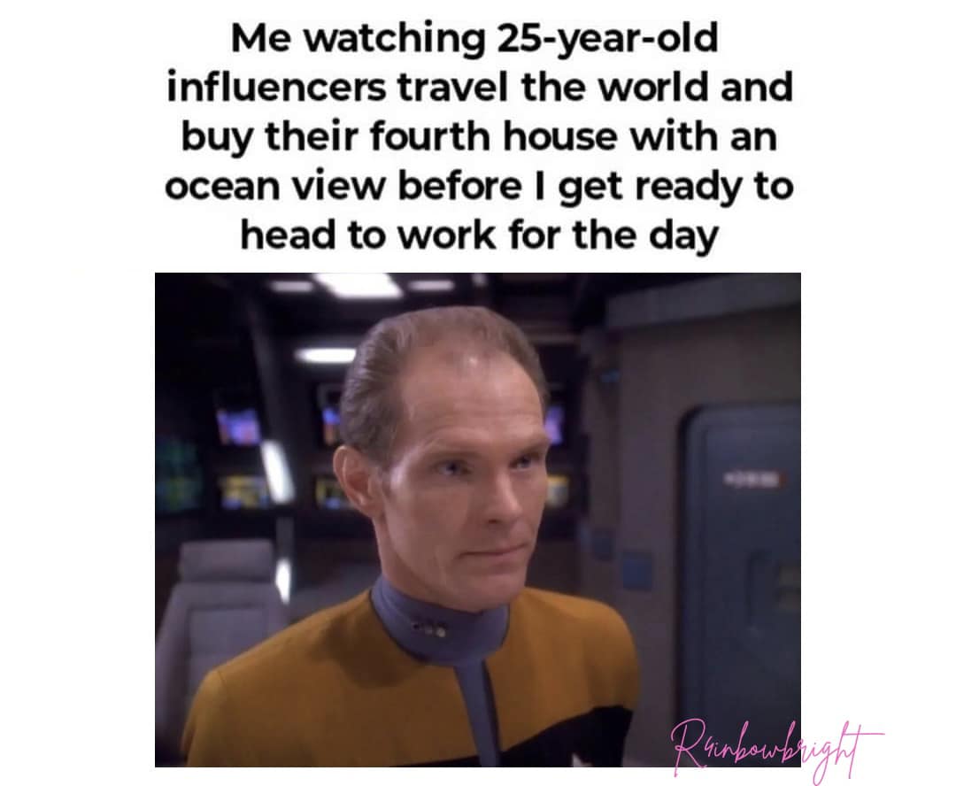 This meme is a humorous commentary on the disparity between the lives of social media influencers and the general public. The image features a photo of a character from the Star Trek franchise, likely Captain Jean-Luc Picard, with a skeptical expression. The accompanying text reads: "Me watching 25-year-old influencers travel the world and buy their fourth house with an ocean view before I get ready for my shift at McDonald's."
