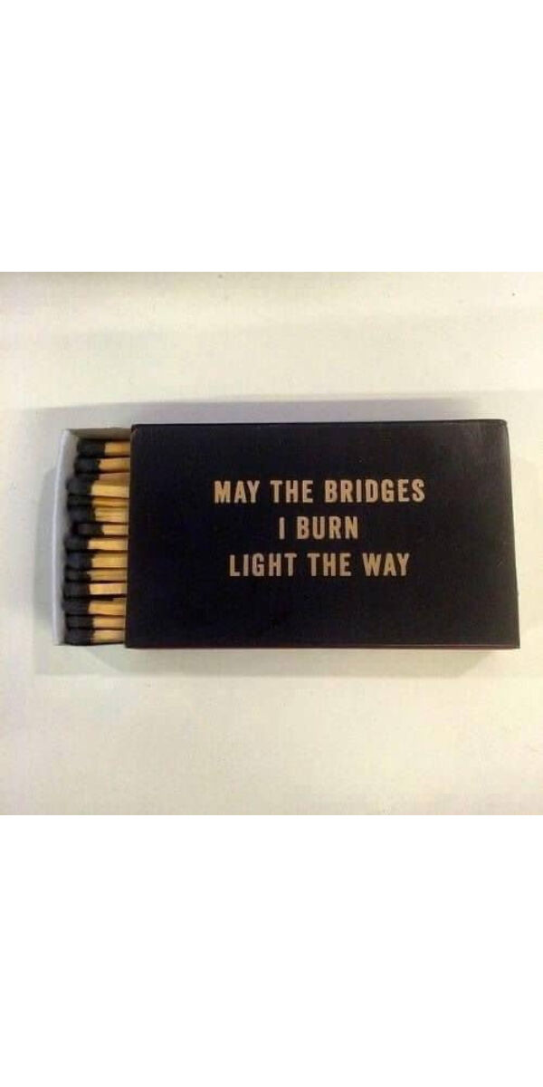 This meme features a box of matches with a humorous message. The text on the box reads: "May the bridges I burn be the roads I take."