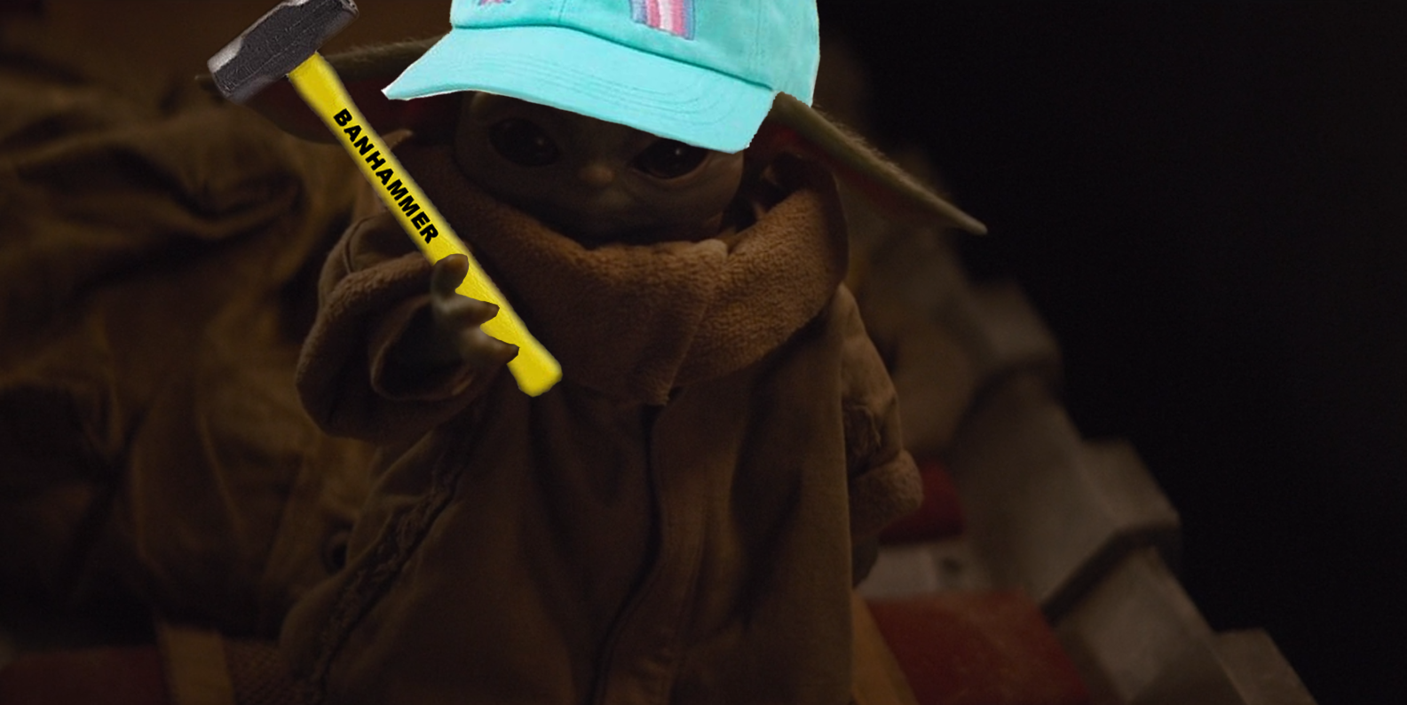 The meme features a still image from the Star Wars franchise, specifically a character known as "Baby Yoda" from the series "The Mandalorian." The character is wearing a hat and holding a hammer, and the text "I'm not a carpenter" is written on the hammer. The image is a humorous take on a common meme format, where a character is given a mundane or unexpected job or occupation.