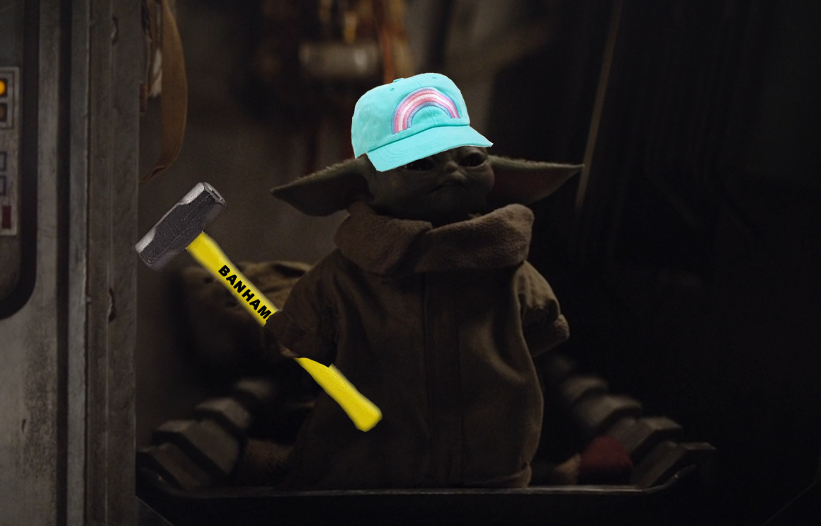 The meme features a photo of the character Baby Yoda from the Star Wars series, dressed in a child's outfit and holding a hammer. The image is captioned "I can build a wall" in a reference to a 2016 presidential campaign slogan, implying that Baby Yoda is a young, skilled worker. The image is likely meant to be humorous and ironic, poking fun at the idea of a young, powerful figure being able to build a wall, a task often associated with a presidential candidate.