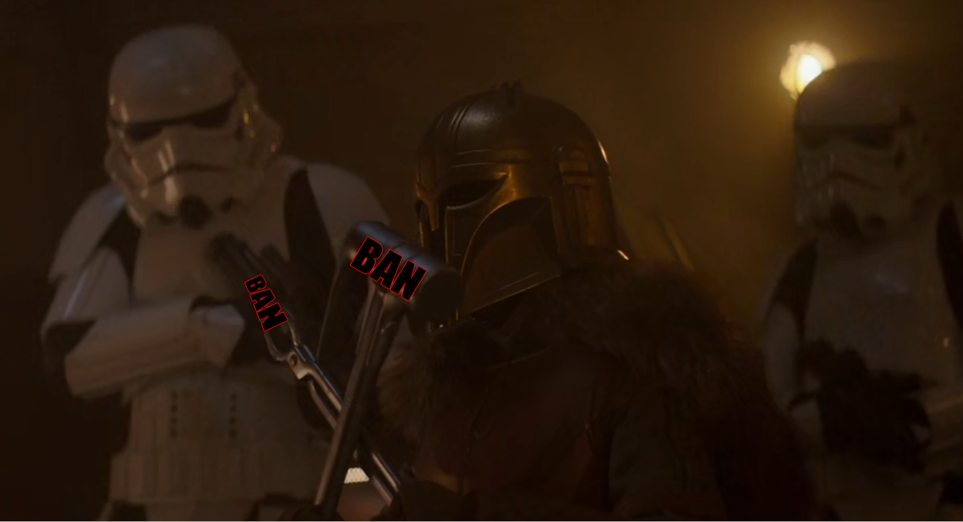 The meme is a screenshot from the Star Wars: The Mandalorian TV series, featuring the character of The Mandalorian (Din Djarin) holding a sign that reads "BAN". The image is likely a humorous take on the character's strict adherence to the Mandalorian code, with the "BAN" sign implying that he's trying to enforce a ban on something, but the exact context is unclear.